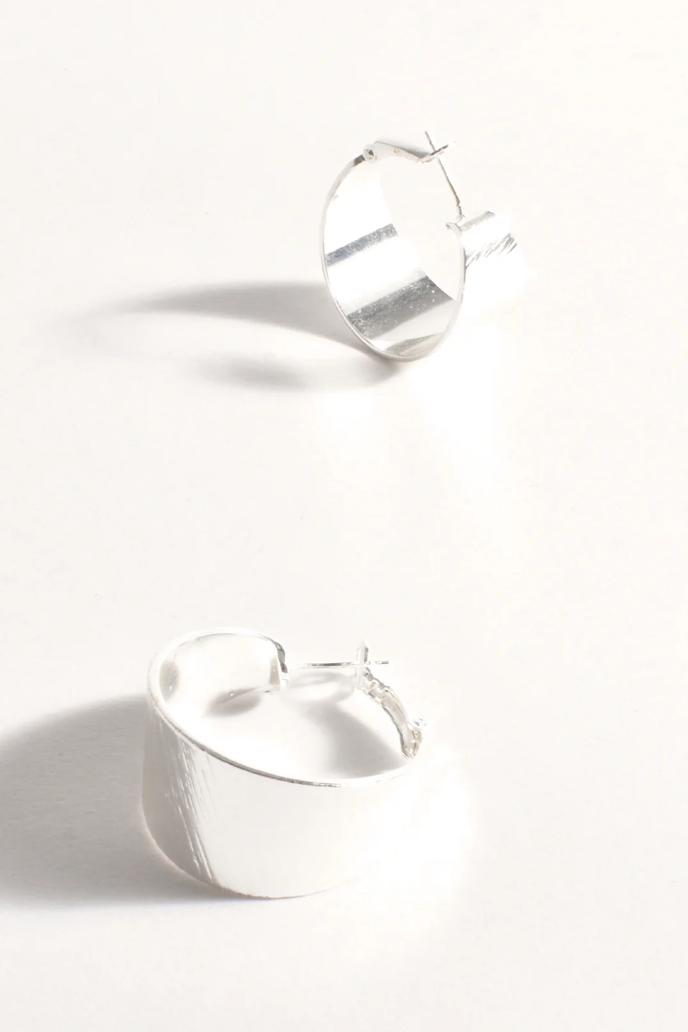 Adorne Wide Textured Hoops - Silver AED4050