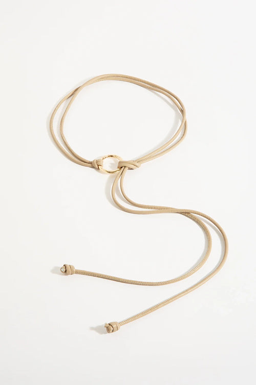 Gold necklace on a white background